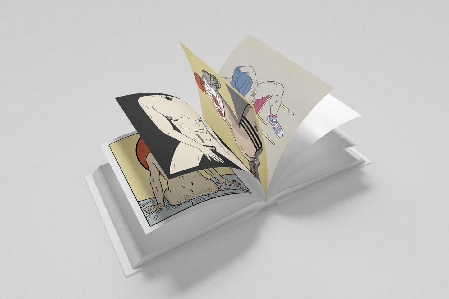 Sample of open hardcover book showing male figure drawings